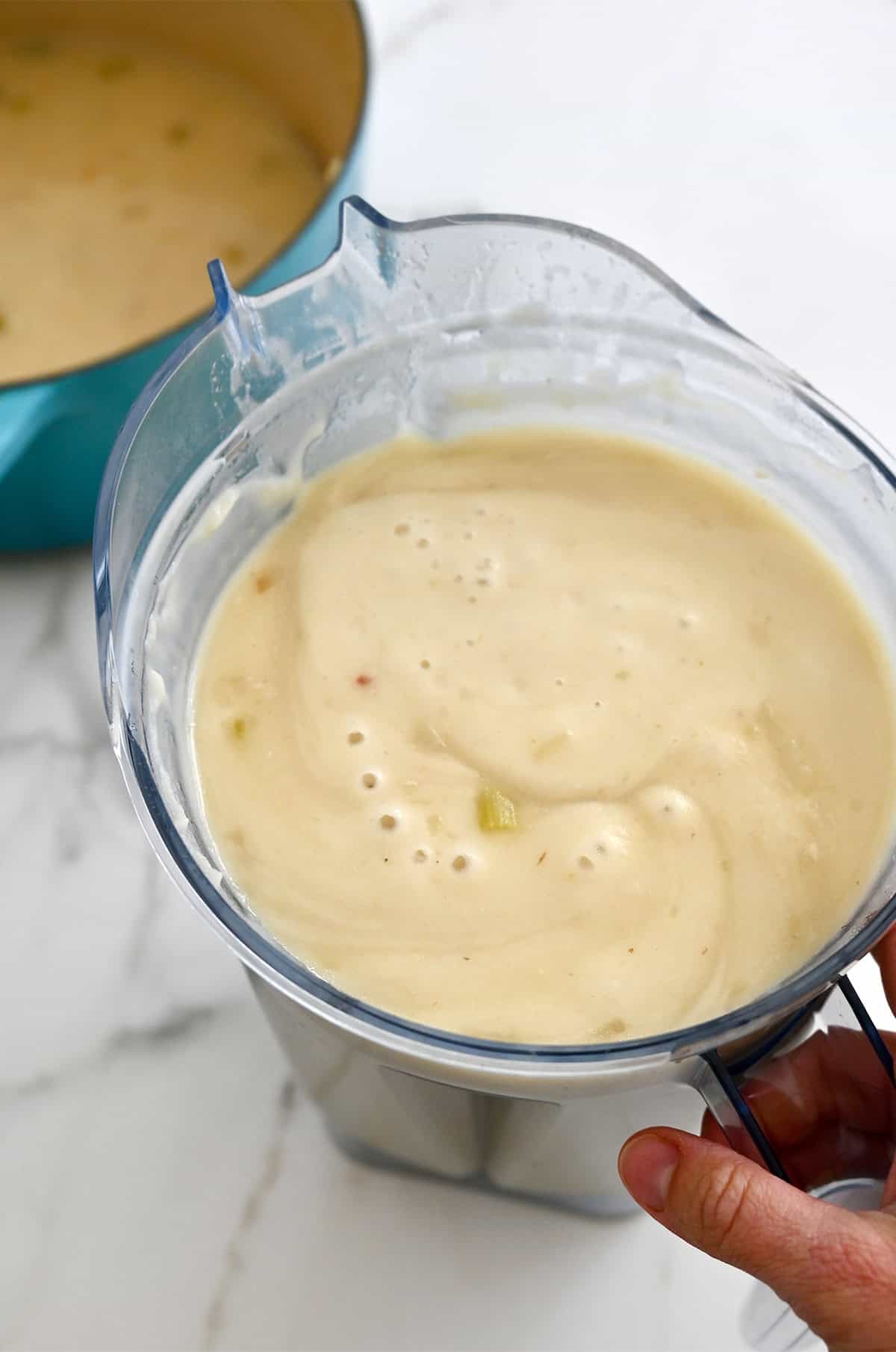 Puréed potato soup in a blender.